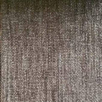 Dark gray woven rug with mottled texture, displaying subtle tonal variations and faint vertical lines across a densely fibrous surface.